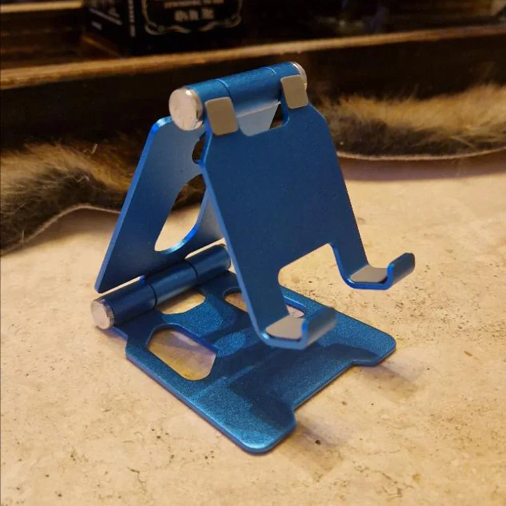 Phone Holder Desktop Metal Phone Stand Foldable Desktop Cell Phone Stand For iPhone 15 14 13 12 Pro Max
Phone Holder Desktop Metal Phone Stand Foldable Desktop Cell Phone Stand For iPhone 15 14 13 12 Pro Max