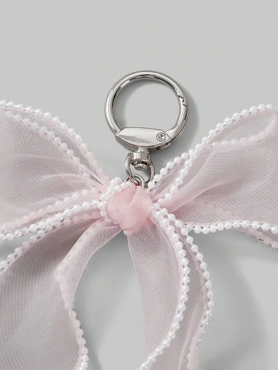 Pink Sheer Fabric Bow Pearl Keychain Bag Charm For Women
Pink Sheer Fabric Bow Pearl Keychain Bag Charm For Women