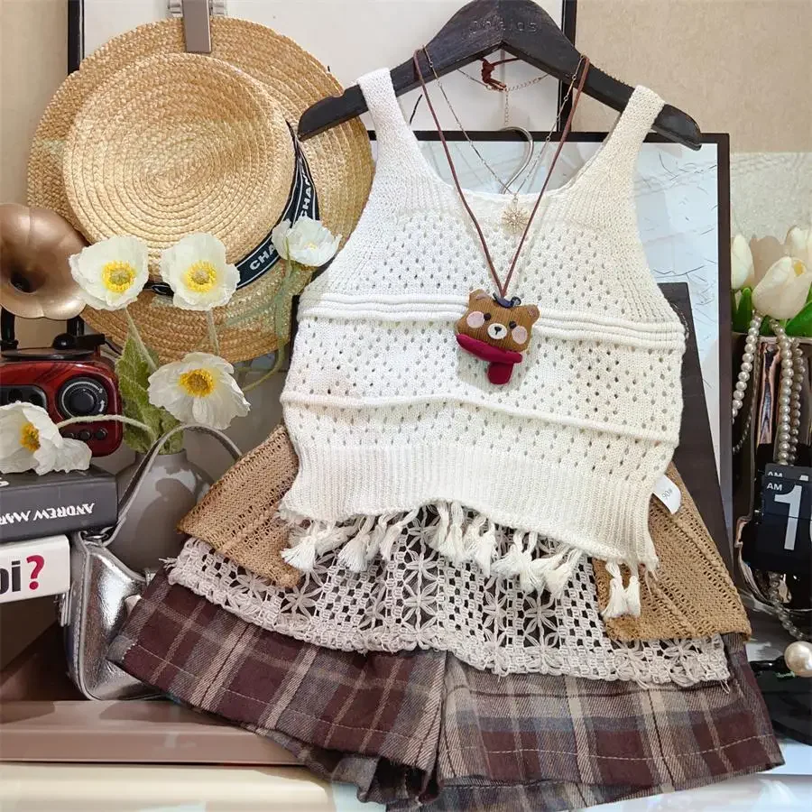 Ethnic Style Camisole Knit Sleeveless Hook Flower Hollow Bohemian Tassel Vest Fashion Plaid Shorts Two-piece Set
Ethnic Style Camisole Knit Sleeveless Hook Flower Hollow Bohemian Tassel Vest Fashion Plaid Shorts Two-piece Set