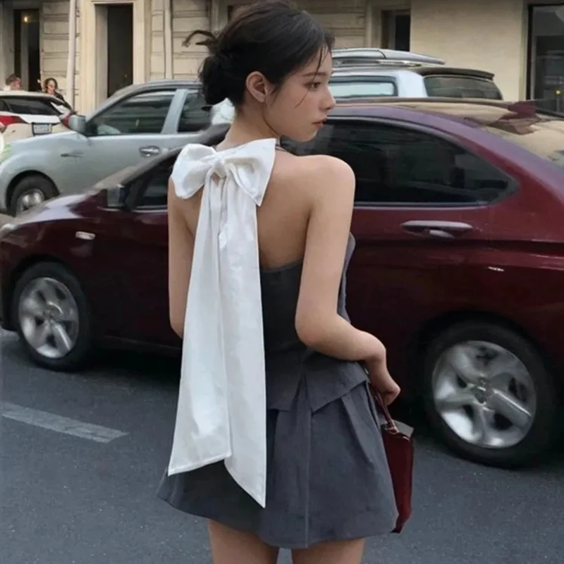 Sexy Backless Bow Accent Vest 2 Piece Set Gray Slim Sleeveless Tank High Waisted Pleated Preppy Style Mini Skirt 2 Piece Set
Sexy Backless Bow Accent Vest 2 Piece Set Gray Slim Sleeveless Tank High Waisted Pleated Preppy Style Mini Skirt 2 Piece Set