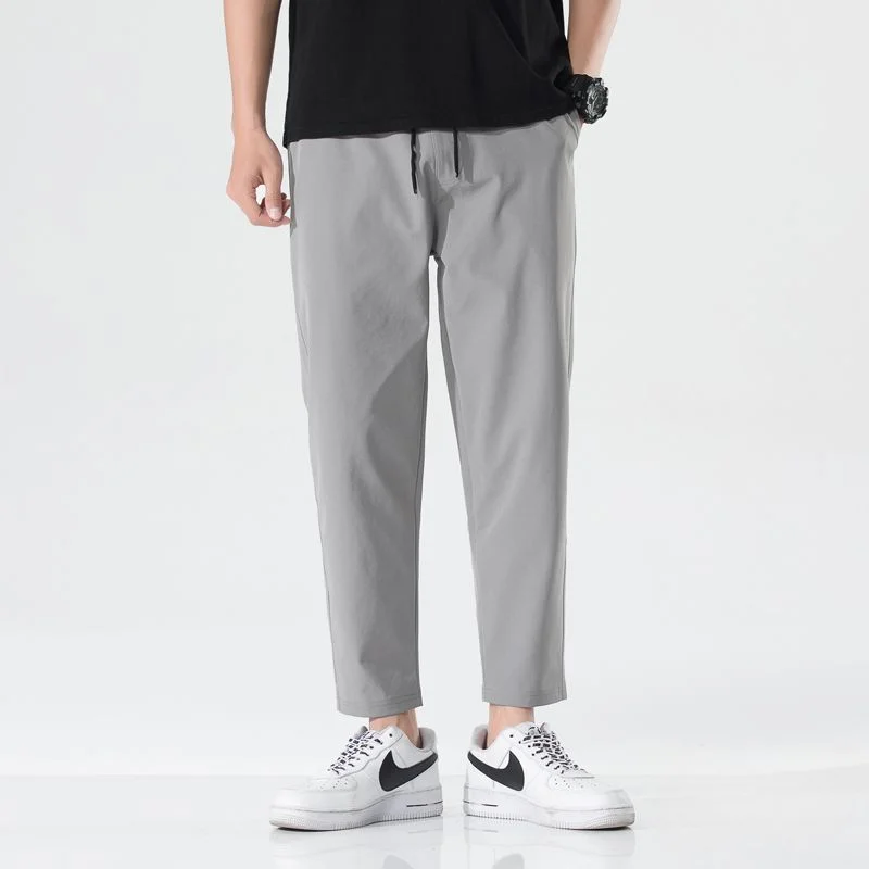 2023 New Summer Ice Silk Men Trousers Spring Thin Casual Men's Loose 9-Point Sportswear Trend Small Foot Men Sports Pants BS35
2023 New Summer Ice Silk Men Trousers Spring Thin Casual Men's Loose 9-Point Sportswear Trend Small Foot Men Sports Pants BS35