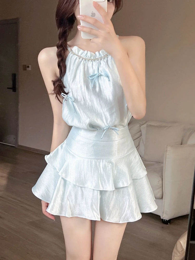 Sweet Hot Girl Bow Buckle Diamond Halter Neck Off-Shoulder Top Women's Summer High Waist Ruffled Cake Shaped Skirt Two-piece Set
Sweet Hot Girl Bow Buckle Diamond Halter Neck Off-Shoulder Top Women's Summer High Waist Ruffled Cake Shaped Skirt Two-piece Set