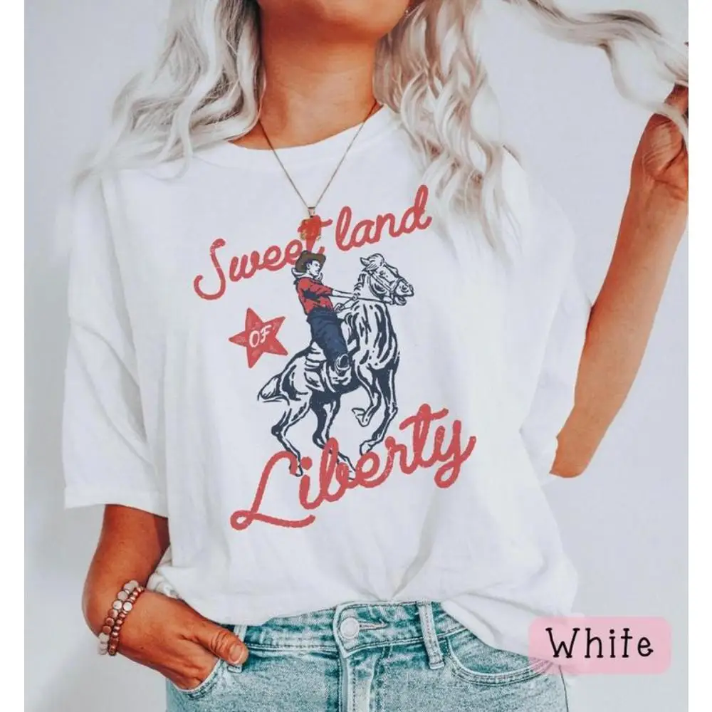 Sweet Land Liberty Tee, Vintage Cowboy Graphic, 4th July Western Shirt, Patriotic Oversized Top, USA Pride Women
Sweet Land Liberty Tee, Vintage Cowboy Graphic, 4th July Western Shirt, Patriotic Oversized Top, USA Pride Women