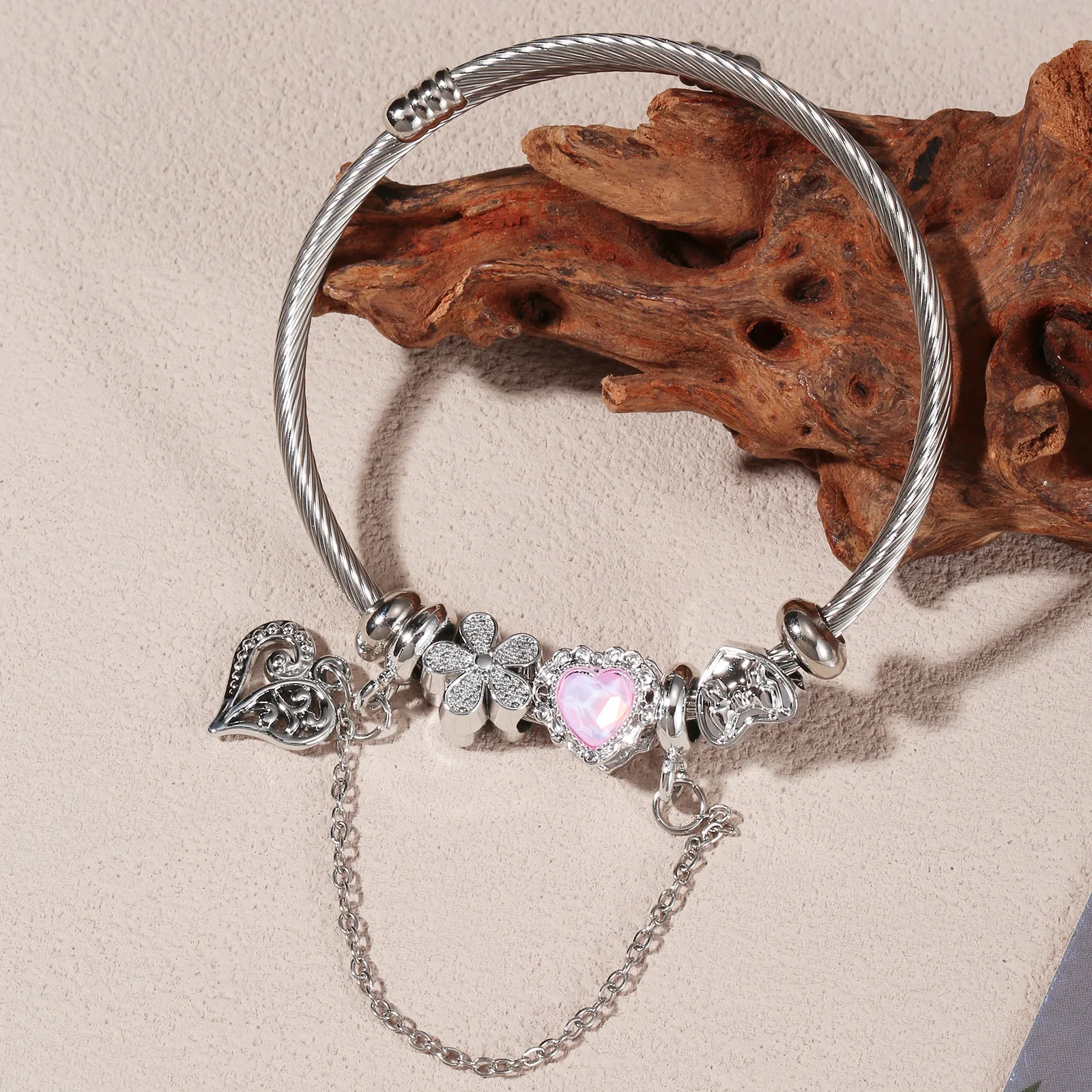 Silvery Stainless Steel Pink Heart Charm Bangle with Safety Chain for Women
Silvery Stainless Steel Pink Heart Charm Bangle with Safety Chain for Women