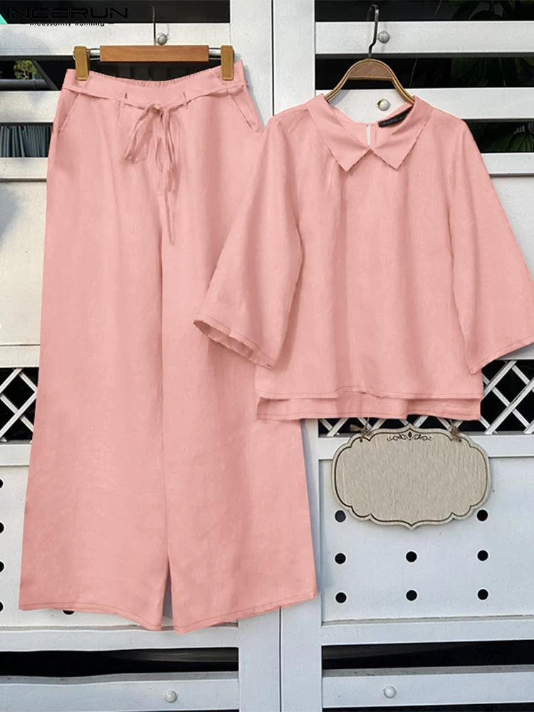 2025 ZANZEA Summer Elegant Lapel Neck 3/4 Sleeve Blouse Pant Sets 2PCS Women Work Matching Sets Casual Solid Outfits Tracksuits
2025 ZANZEA Summer Elegant Lapel Neck 3/4 Sleeve Blouse Pant Sets 2PCS Women Work Matching Sets Casual Solid Outfits Tracksuits
