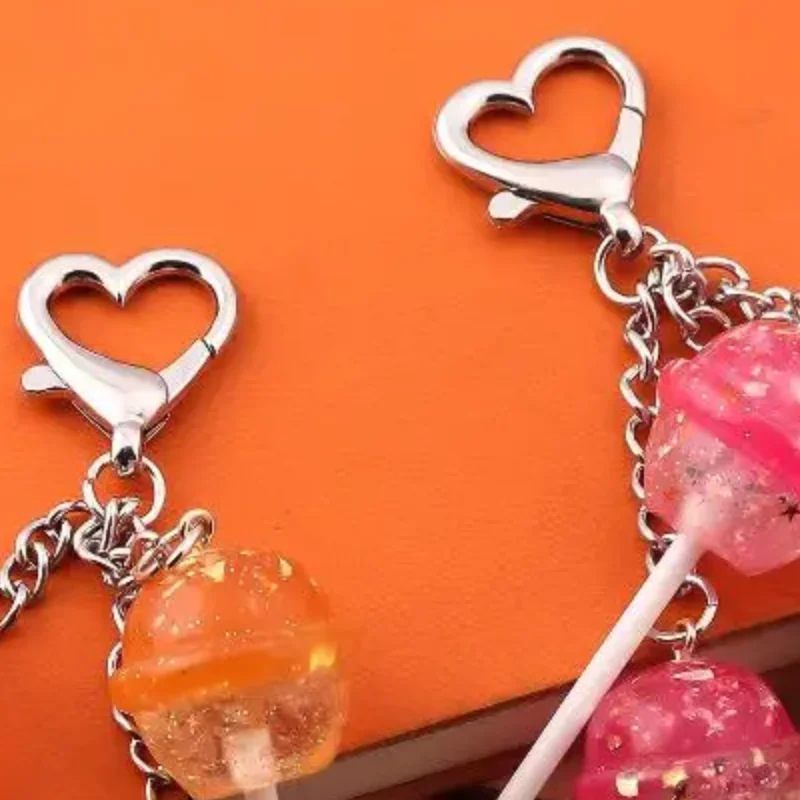 1-Pack Transparent Candy Case Pendant Simulated Lollipop Keychain Female Essentials Gel Color Miniature Sweets Key Ring Gift 
1-Pack Transparent Candy Case Pendant Simulated Lollipop Keychain Female Essentials Gel Color Miniature Sweets Key Ring Gift