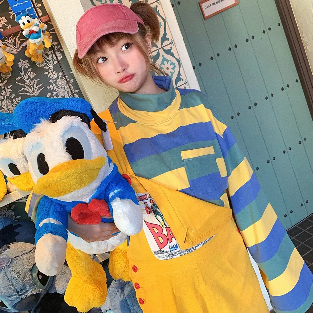 Очаровательная цветная полосатая футболка с длинным рукавом и высоким воротником, свободного кроя, универсальная повседневная хлопковая женская кофта для весны и осени
Очаровательная цветная полосатая футболка с длинным рукавом и высоким воротником, свободного кроя, универсальная повседневная хлопковая женская кофта для весны и осени