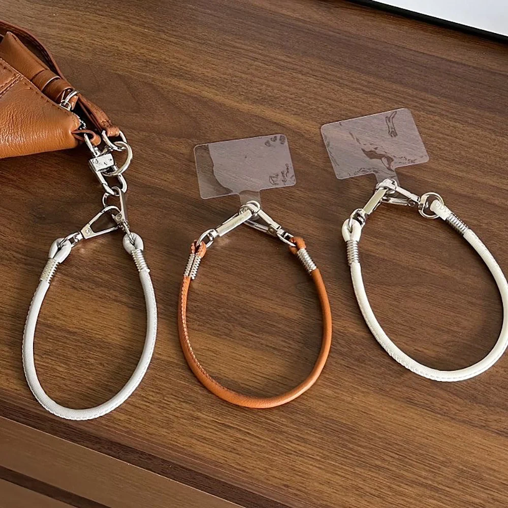 Universal Outdoor Phone Charm Accessories Leather Lanyard Short Wrist Strap Pendant Anti-loss Hand Rope With Metal Buckle
Universal Outdoor Phone Charm Accessories Leather Lanyard Short Wrist Strap Pendant Anti-loss Hand Rope With Metal Buckle