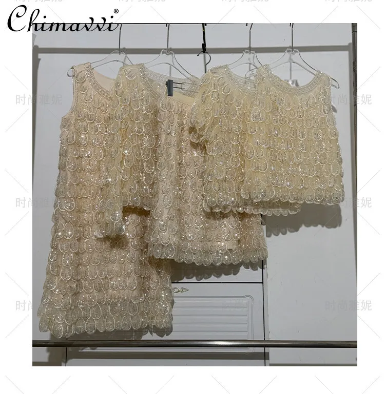 Fashion Lace Sequin Beaded Pearl Long Sleeve Short Sleeve Top Vest Skirt Two-piece Set Spring Summer 2026 New Womens Outfits
Fashion Lace Sequin Beaded Pearl Long Sleeve Short Sleeve Top Vest Skirt Two-piece Set Spring Summer 2026 New Womens Outfits