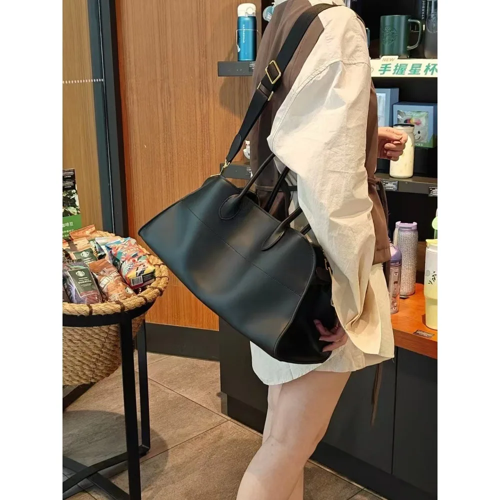 Нишевый дизайн, минималистичный стиль Old Money, портативная женская сумка через плечо, кожаная сумка-тоут, простая универсальная сумка
Нишевый дизайн, минималистичный стиль Old Money, портативная женская сумка через плечо, кожаная сумка-тоут, простая универсальная сумка