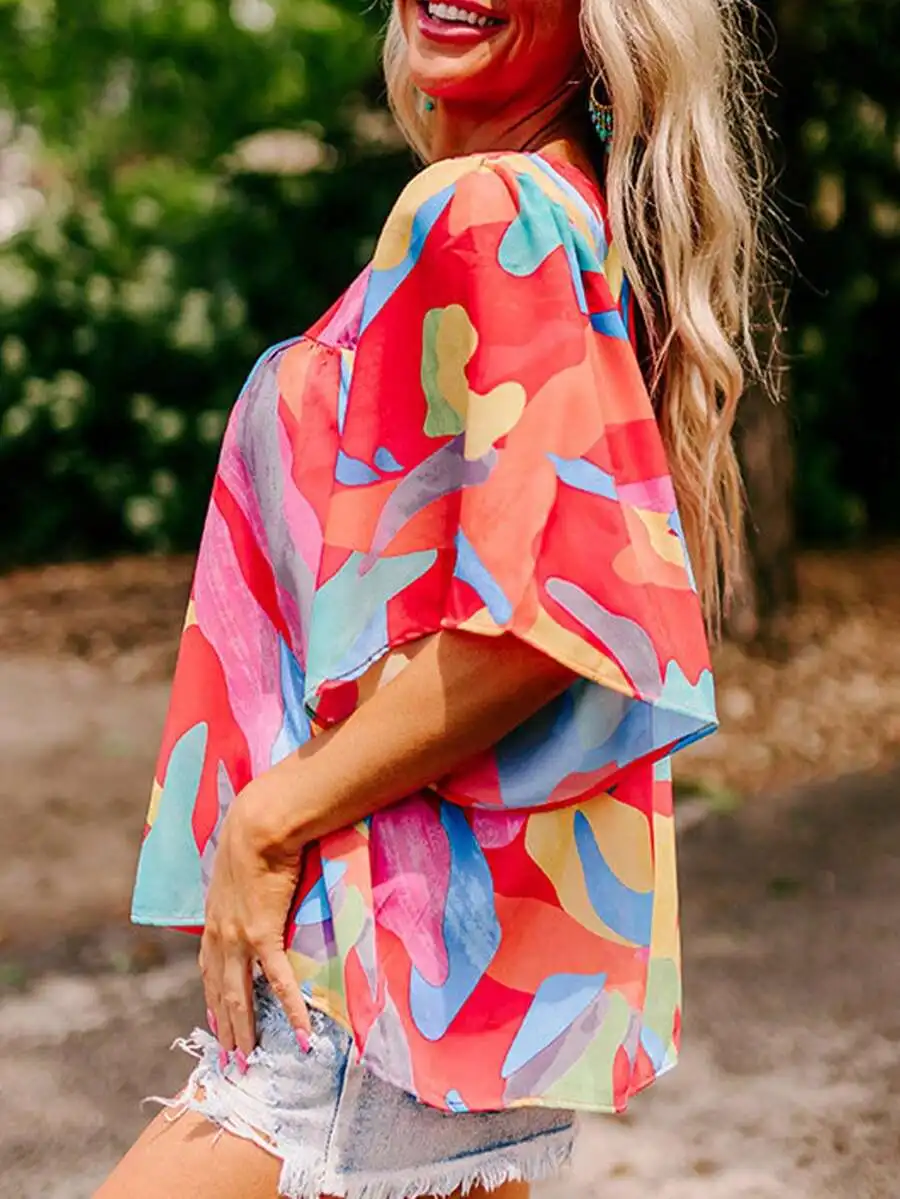 Vibrant Abstract Print Flowy Blouse With Round Neck For Women Summer Casual Wear
Vibrant Abstract Print Flowy Blouse With Round Neck For Women Summer Casual Wear