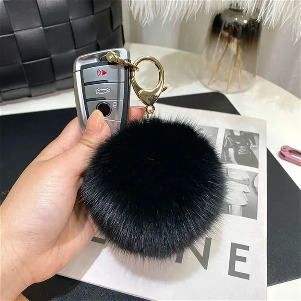 Luxury Fluffy Soft Pompom Ball Keychain Hanging Decoration Bag Charm Fur Ball Keyring 9CM Backpack Fur Pendant Women Girls 
Luxury Fluffy Soft Pompom Ball Keychain Hanging Decoration Bag Charm Fur Ball Keyring 9CM Backpack Fur Pendant Women Girls