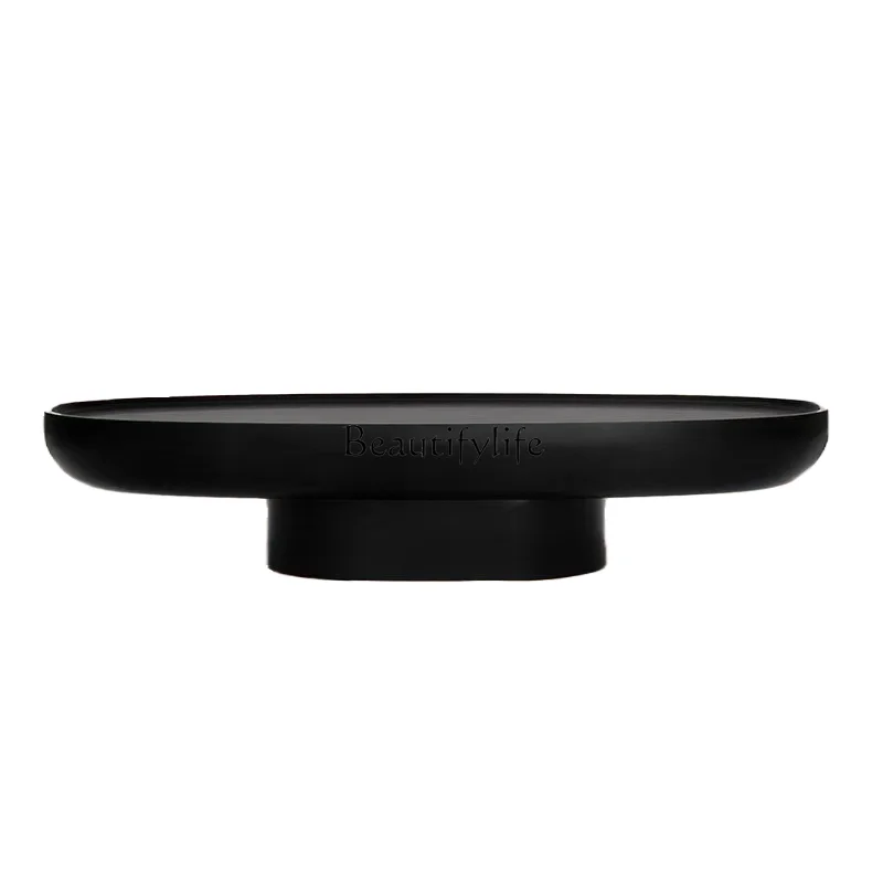 Simple light luxury modern oval black coffee table household wabi-sabi wind small tea table
Simple light luxury modern oval black coffee table household wabi-sabi wind small tea table
