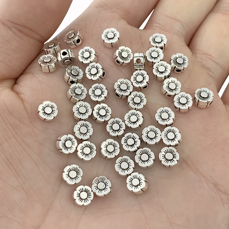 20 x Antique Silver Color Flower Spacer Beads Charms Pendants For DIY Bracelets Necklace Earrings Jewelry Making Accessories 1mm
20 x Antique Silver Color Flower Spacer Beads Charms Pendants For DIY Bracelets Necklace Earrings Jewelry Making Accessories 1mm