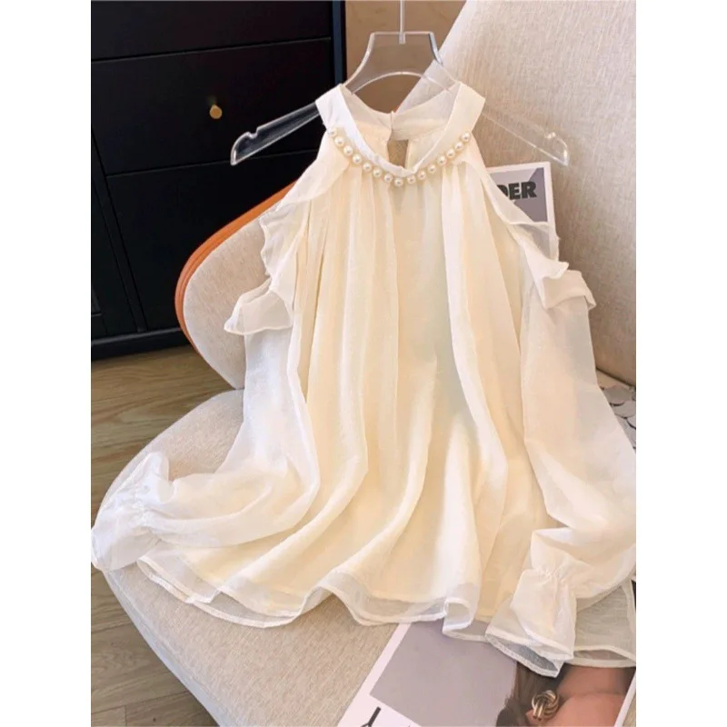 2025 Spring Summer New French Pearl Hanging Neck Women Off Shoulder Chiffon Top Fashion Horn Long Sleeve Female Shirt
2025 Spring Summer New French Pearl Hanging Neck Women Off Shoulder Chiffon Top Fashion Horn Long Sleeve Female Shirt