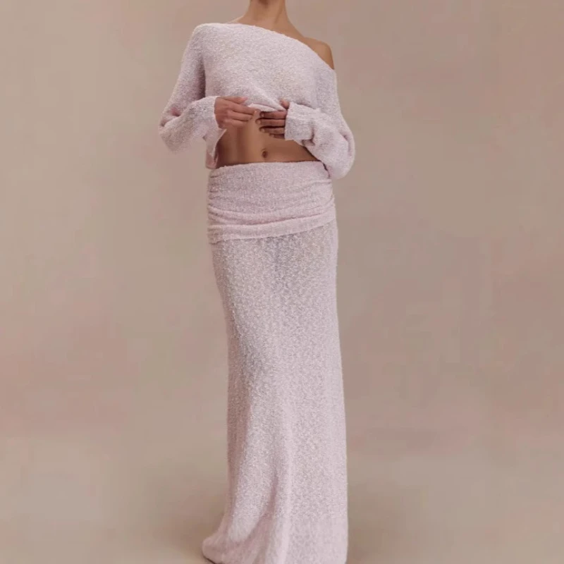 Knitted Long-sleeve Off-shoulder Top with Pleated Long Skirt, Solid Color Fashionable Two-piece Suit for Women.
Knitted Long-sleeve Off-shoulder Top with Pleated Long Skirt, Solid Color Fashionable Two-piece Suit for Women.