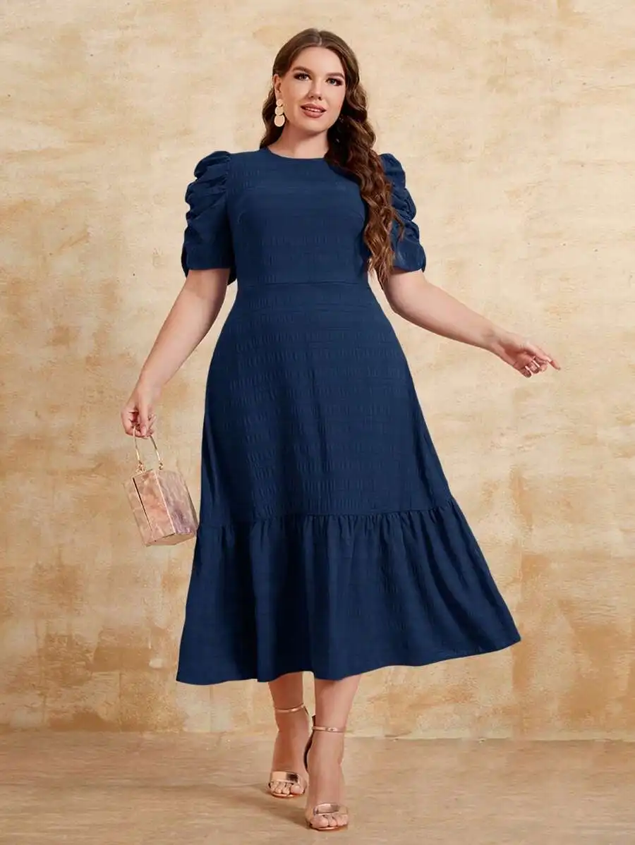 Navy Blue Puff Sleeve Midi Dress with Ruffle Hem and Textured Fabric
Navy Blue Puff Sleeve Midi Dress with Ruffle Hem and Textured Fabric