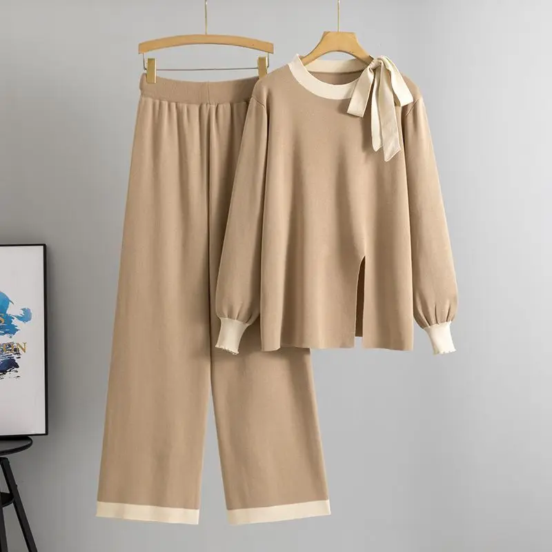 Winter Fashion Round Neck Strap with Lantern Sleeve Knitted Top High Waist Casual Pants Goddess Style High-grade Two-piece Set
Winter Fashion Round Neck Strap with Lantern Sleeve Knitted Top High Waist Casual Pants Goddess Style High-grade Two-piece Set