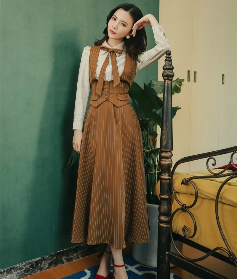 Retro Briti Sle Two-Piece Suit Set with Vest irt And Skirt for Profional Commuting Striped Faion Ensemble
Retro Briti Sle Two-Piece Suit Set with Vest irt And Skirt for Profional Commuting Striped Faion Ensemble