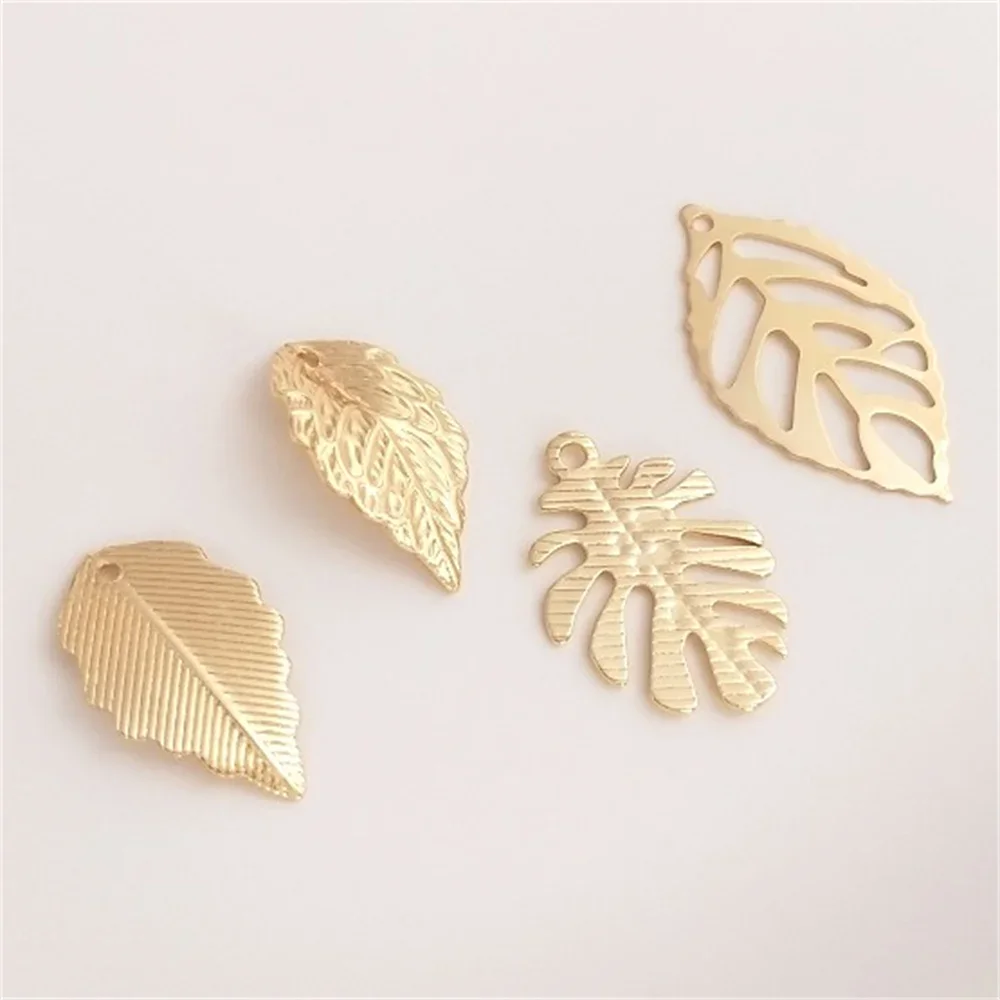 14K Gold Color Leaf Pendant Copper Plated Real Gold Leaf Charm Handmade DIY Bracelet Earrings Ear Jewelry Pendant K218
14K Gold Color Leaf Pendant Copper Plated Real Gold Leaf Charm Handmade DIY Bracelet Earrings Ear Jewelry Pendant K218