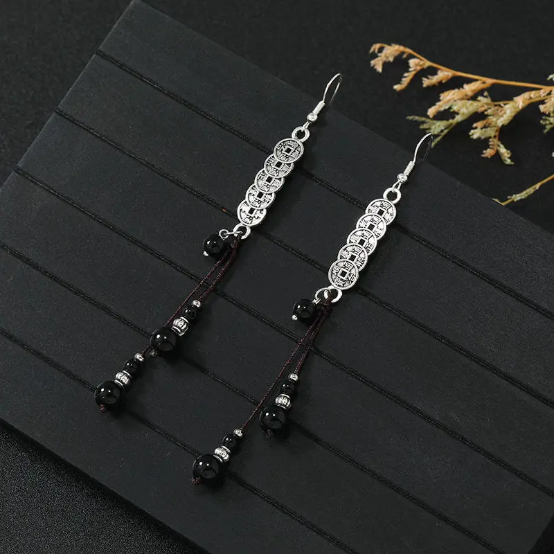 Новый китайский этнический стиль, ниша, медная монета, кисточка, горный призрак, талисман, длинные серьги-капли, винтажные уникальные ювелирные изделия ручной работы
Новый китайский этнический стиль, ниша, медная монета, кисточка, горный призрак, талисман, длинные серьги-капли, винтажные уникальные ювелирные изделия ручной работы