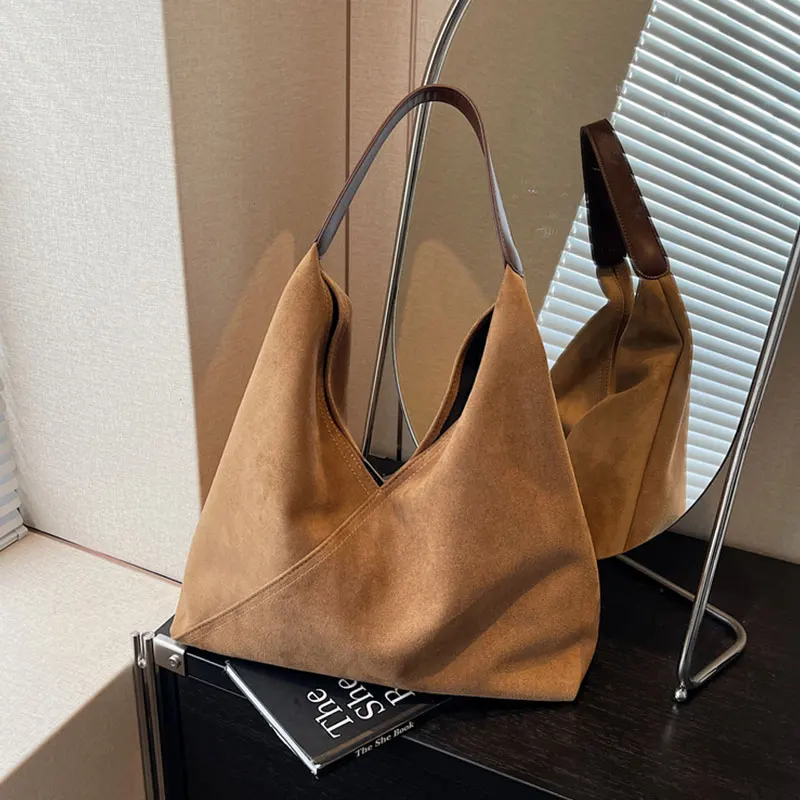 Autumn and winter new suede armpit bag women's cross-retro fashion high-capacity shoulder bag high-grade sento bag
Autumn and winter new suede armpit bag women's cross-retro fashion high-capacity shoulder bag high-grade sento bag