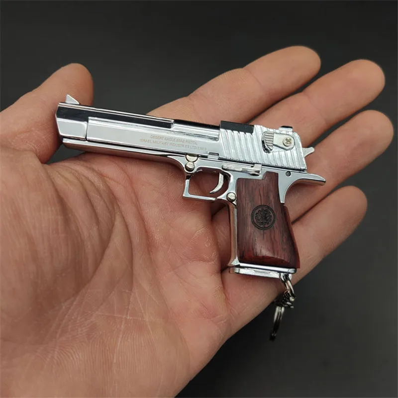 1:3 Desert Eagle цельная деревянная ручка металлический пистолет Модель брелок миниатюрные игрушечные пистолеты сплав пистолет Коллекция игрушек подарок кулон
1:3 Desert Eagle цельная деревянная ручка металлический пистолет Модель брелок миниатюрные игрушечные пистолеты сплав пистолет Коллекция игрушек подарок кулон