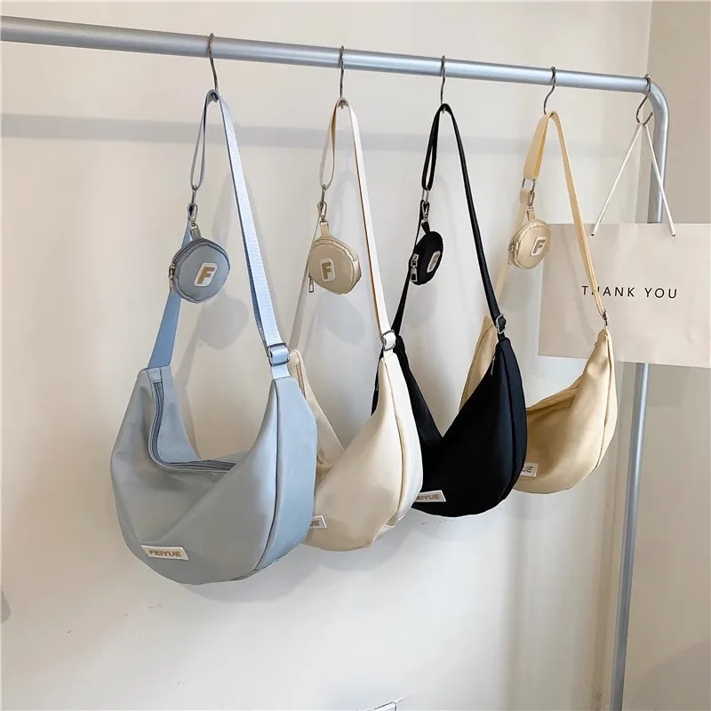 Women Female Fashion Dumpling Bag Commuter Crossbody All-in-one Canvas Student Schoolbag Female Phone Bag 
Women Female Fashion Dumpling Bag Commuter Crossbody All-in-one Canvas Student Schoolbag Female Phone Bag