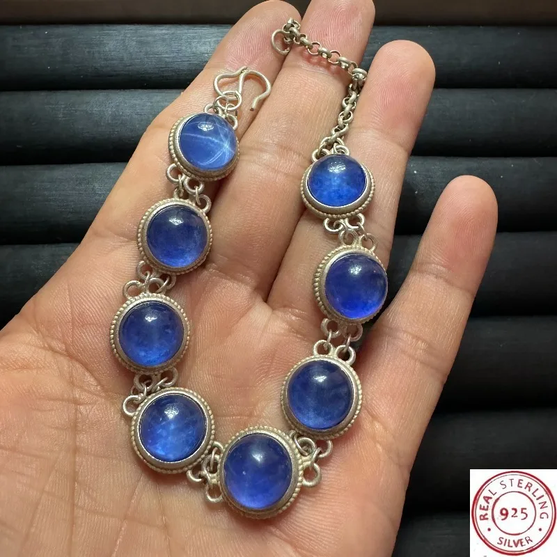 Handmade Tibetan Silver Bracelet, Inlaid Red & Blue Star Gem Cabochons, Adjustable Open Design, Vintage Ethnic Jewelry
Handmade Tibetan Silver Bracelet, Inlaid Red & Blue Star Gem Cabochons, Adjustable Open Design, Vintage Ethnic Jewelry