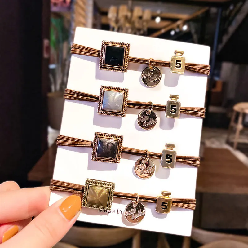 200Pcs/Lot DIY Simple Multi Acrylic Sqaure Bowknot Hair Rings Bracelets Rubber Bands Styling Tools Accessories HA1748
200Pcs/Lot DIY Simple Multi Acrylic Sqaure Bowknot Hair Rings Bracelets Rubber Bands Styling Tools Accessories HA1748