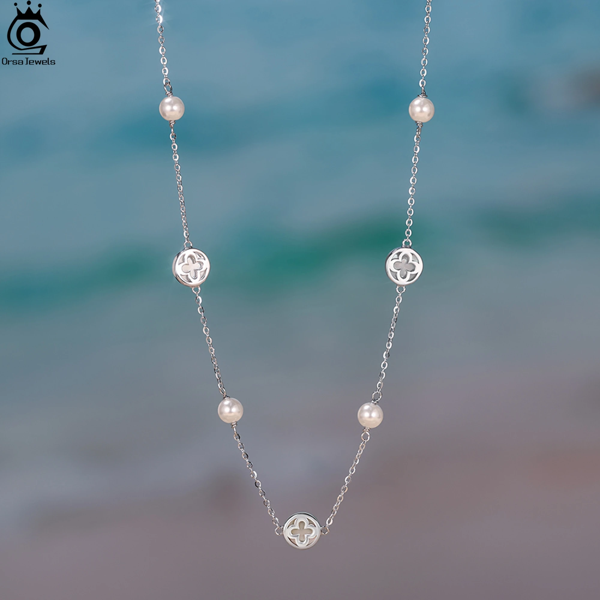 ORSA JEWELS Ожерелье-чокер с блестящим жемчугом и ракушками, стерлинговое серебро 925 пробы, дизайн четырехлистного клевера, стиль природы, летний подарок GMN63
ORSA JEWELS Ожерелье-чокер с блестящим жемчугом и ракушками, стерлинговое серебро 925 пробы, дизайн четырехлистного клевера, стиль природы, летний подарок GMN63