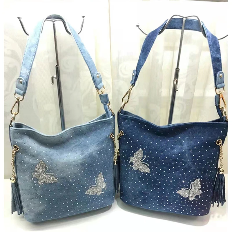 iPinee New trend diamond-studded butterfly hand-held one-shoulder messenger bag fashion small fresh denim rivet tassel
iPinee New trend diamond-studded butterfly hand-held one-shoulder messenger bag fashion small fresh denim rivet tassel