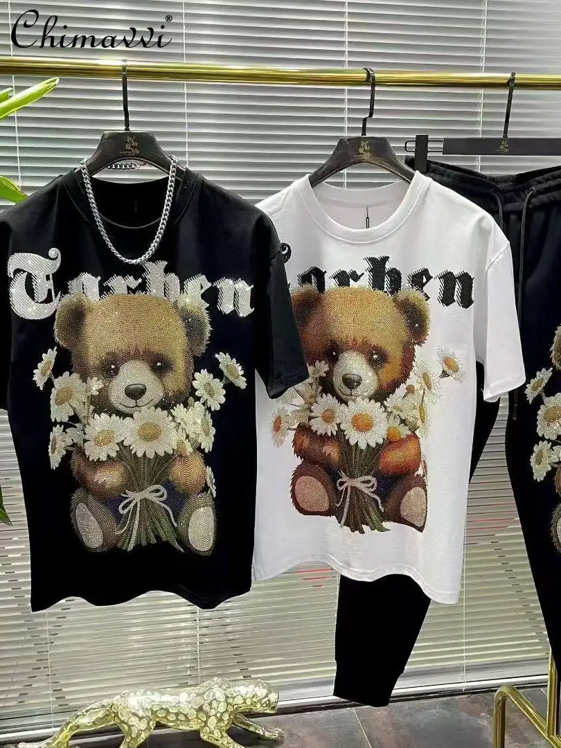 2026 Spring and Summer New Heavy Rhinestone Black Fashion Letter Bear Short Sleeve Top Fashion Larger Size Casual Long Pants
2026 Spring and Summer New Heavy Rhinestone Black Fashion Letter Bear Short Sleeve Top Fashion Larger Size Casual Long Pants