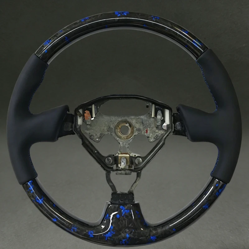 Blue Forged Carbon Fiber Steering Wheel for Toyota Supra MK4 with Smooth Leather Fits for Supra MK4 RAV4 High Quality Wheel Part
Blue Forged Carbon Fiber Steering Wheel for Toyota Supra MK4 with Smooth Leather Fits for Supra MK4 RAV4 High Quality Wheel Part