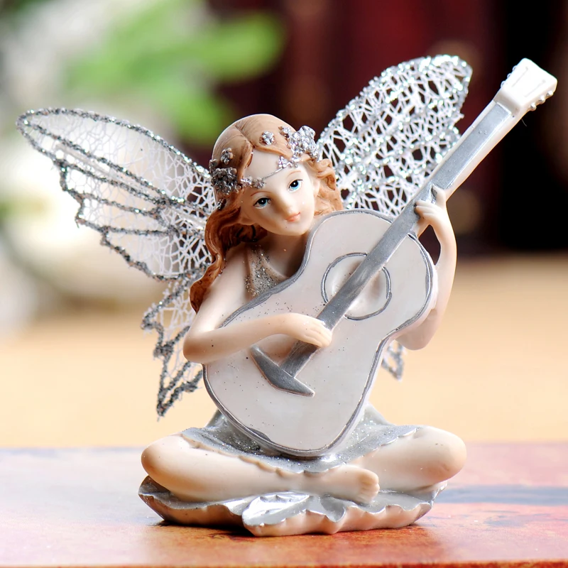 European Resin Girl Musical Instrument Angel Decoration Art Children's Room Cello Guitar Flower Fairy Figurines Ornaments Crafts
European Resin Girl Musical Instrument Angel Decoration Art Children's Room Cello Guitar Flower Fairy Figurines Ornaments Crafts
