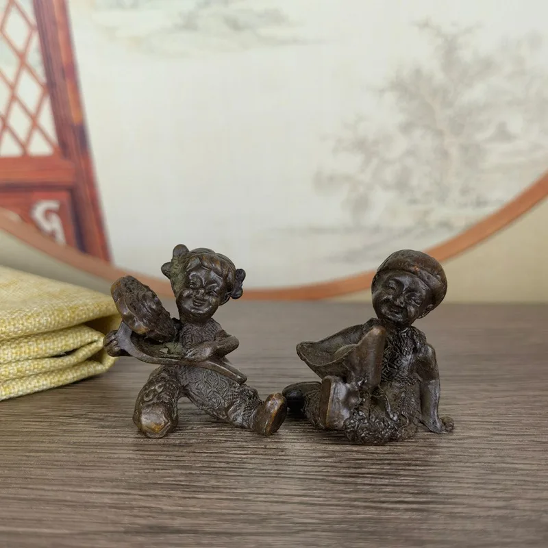 Solid boy ornament antique antique collection boy and girl pair tea table tea pet character ornament copper animal statue
Solid boy ornament antique antique collection boy and girl pair tea table tea pet character ornament copper animal statue