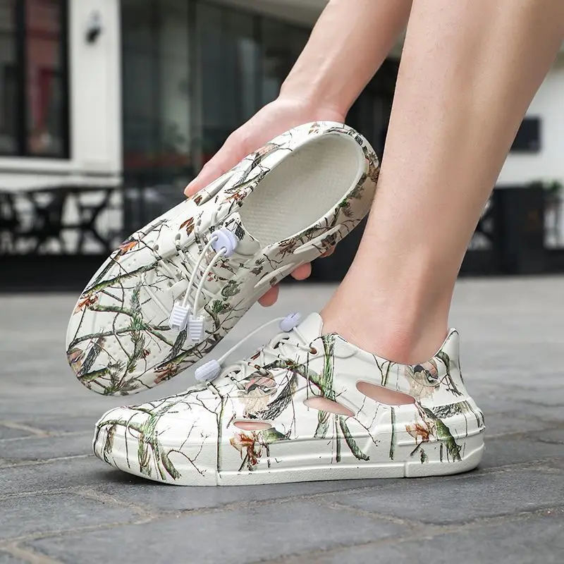 Мужские сандалии Trend 2025 с закрытым носком и полым принтом, пляжные сандалии на открытом воздухе, Eva Breathable 39, высококачественная повседневная мужская обувь, оптовая продажа
Мужские сандалии Trend 2025 с закрытым носком и полым принтом, пляжные сандалии на открытом воздухе, Eva Breathable 39, высококачественная повседневная мужская обувь, оптовая продажа