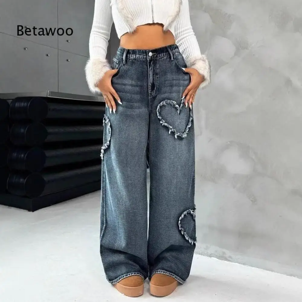 Dark Wash Denim Jeans with Frayed Heart Details
Dark Wash Denim Jeans with Frayed Heart Details