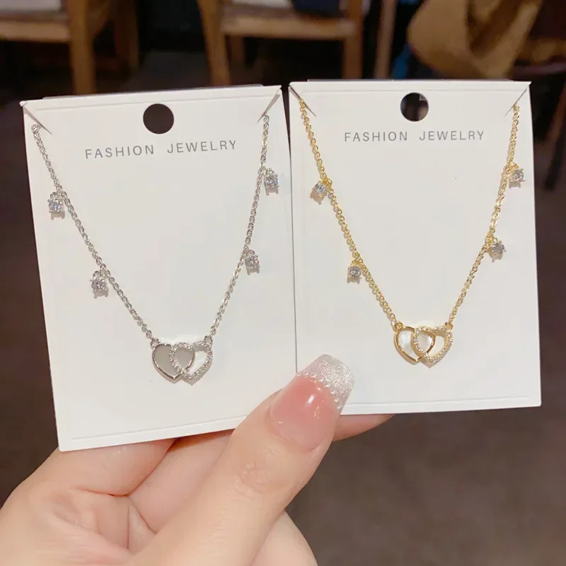 Spring New Fashionable Sweet Versatile Shell Double Heart Pendant Necklace Women's Clavicle Chain Design Jewelry Accessory
Spring New Fashionable Sweet Versatile Shell Double Heart Pendant Necklace Women's Clavicle Chain Design Jewelry Accessory