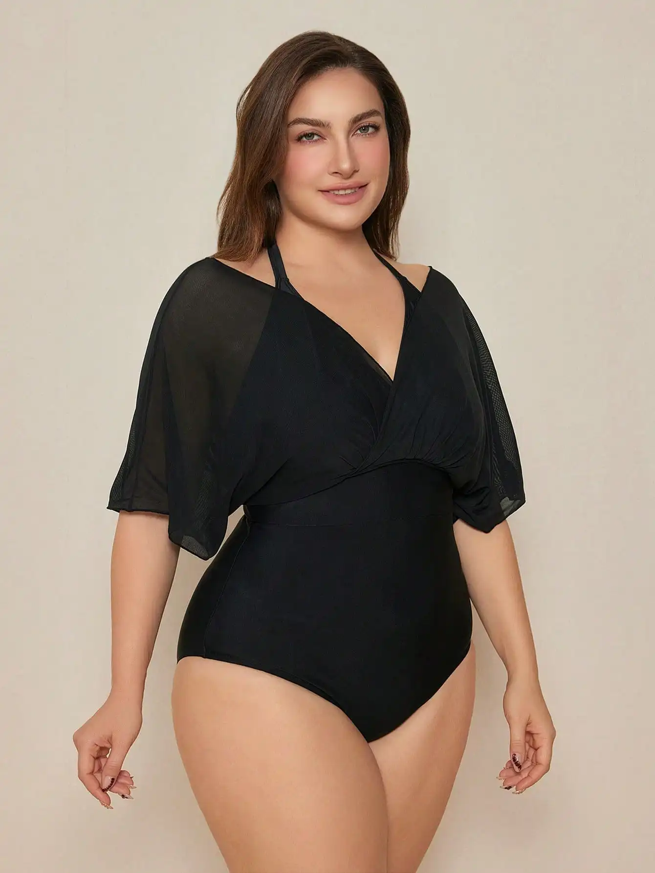 Plus Size Black Mesh Overlay Fake Two-Piece One Piece Swimsuit
Plus Size Black Mesh Overlay Fake Two-Piece One Piece Swimsuit