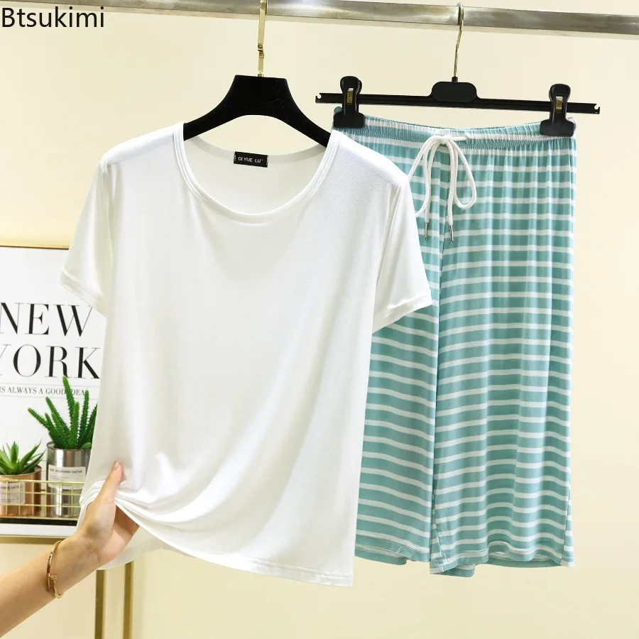 2026 Свободные пижамные комплекты из модала, женская летняя новая верхняя одежда, белая футболка с короткими рукавами, большой домашний топ, комплект укороченных брюк в полоску
2026 Свободные пижамные комплекты из модала, женская летняя новая верхняя одежда, белая футболка с короткими рукавами, большой домашний топ, комплект укороченных брюк в полоску