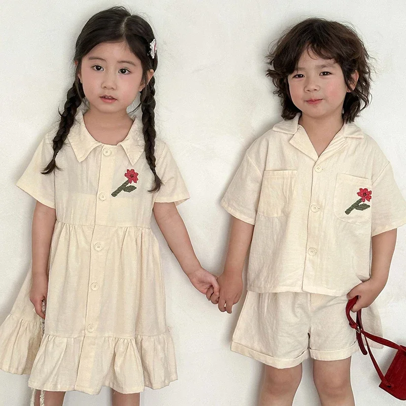 Children's Summer Shirt Set Siblings' Outfit Casual Boys Embroidered Flower Top Shorts 2pcs Girls' Single-breasted Lapel Dress
Children's Summer Shirt Set Siblings' Outfit Casual Boys Embroidered Flower Top Shorts 2pcs Girls' Single-breasted Lapel Dress