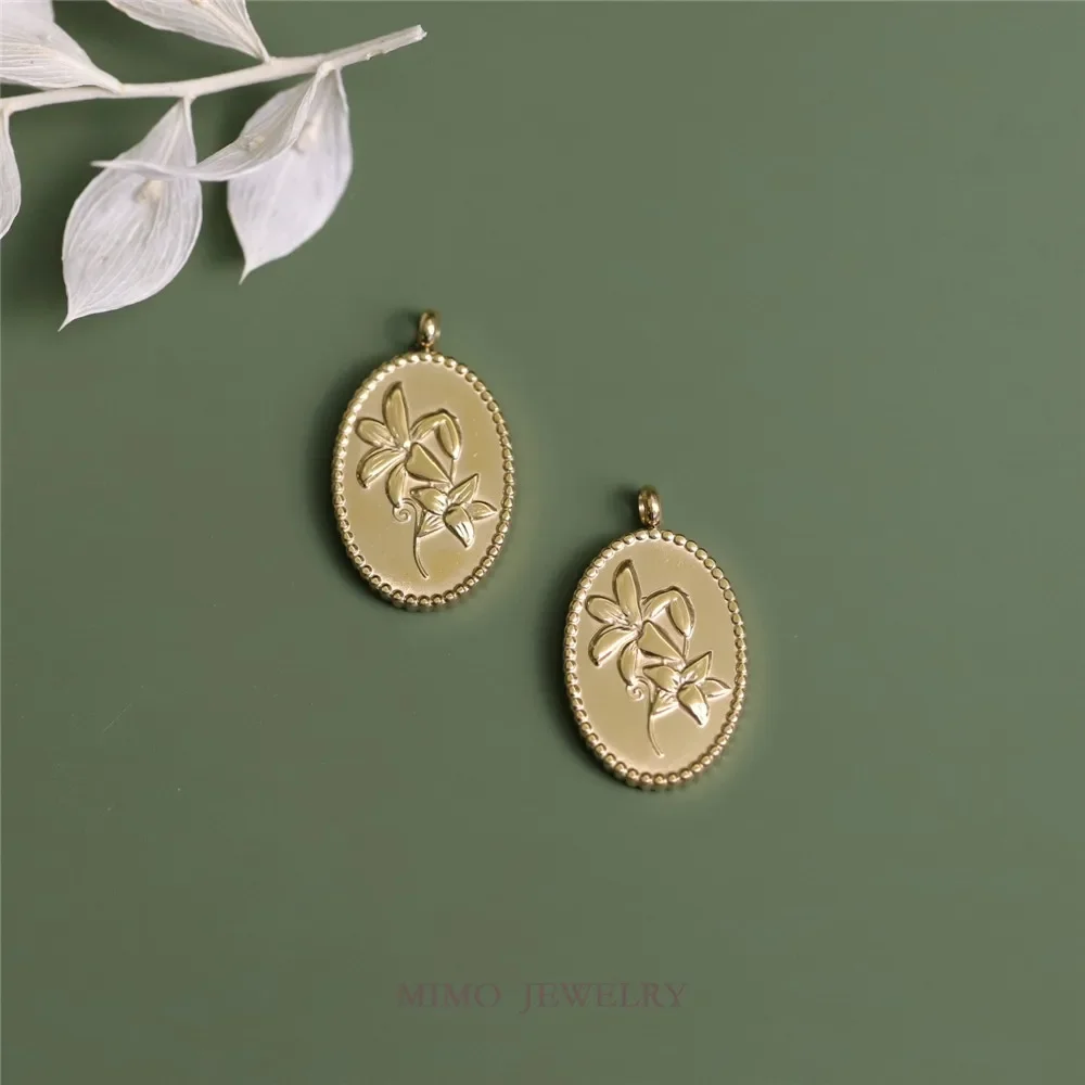 Gold-plated titanium steel double sided lily relief vintage oval pendant DIY accessory
Gold-plated titanium steel double sided lily relief vintage oval pendant DIY accessory