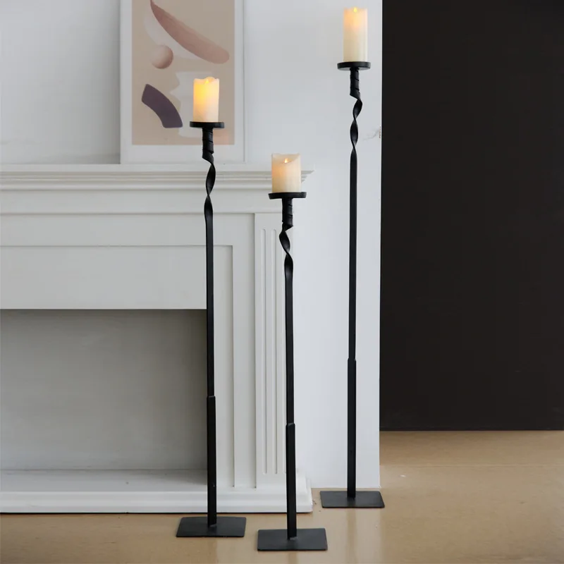 Creative and simple black cast iron tall floor candlestick ornament, modern model room hotel club decoration
Creative and simple black cast iron tall floor candlestick ornament, modern model room hotel club decoration