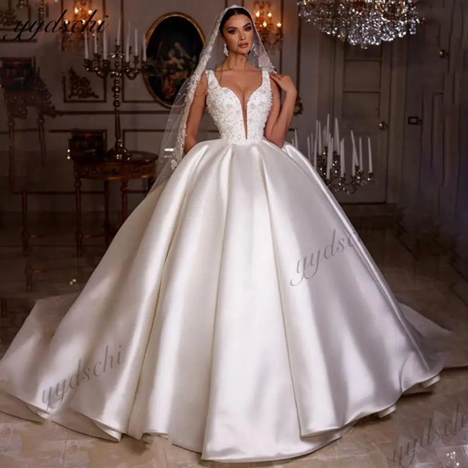 Luxury Ivory Glitter Pearls Beaded Wedding Dresses 2023 Satin Sleeveless Arabia Dubai Bridal Gowns Court Train Vestido De Noiva
Luxury Ivory Glitter Pearls Beaded Wedding Dresses 2023 Satin Sleeveless Arabia Dubai Bridal Gowns Court Train Vestido De Noiva