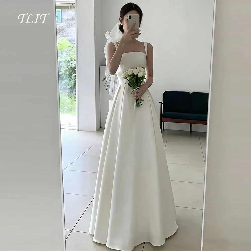 TLIT Simple White Silk Satin A-Line Wedding Gown Customized Spaghetti Strap Bridal Gown Korea Wedding Dress Photos Shoot
TLIT Simple White Silk Satin A-Line Wedding Gown Customized Spaghetti Strap Bridal Gown Korea Wedding Dress Photos Shoot