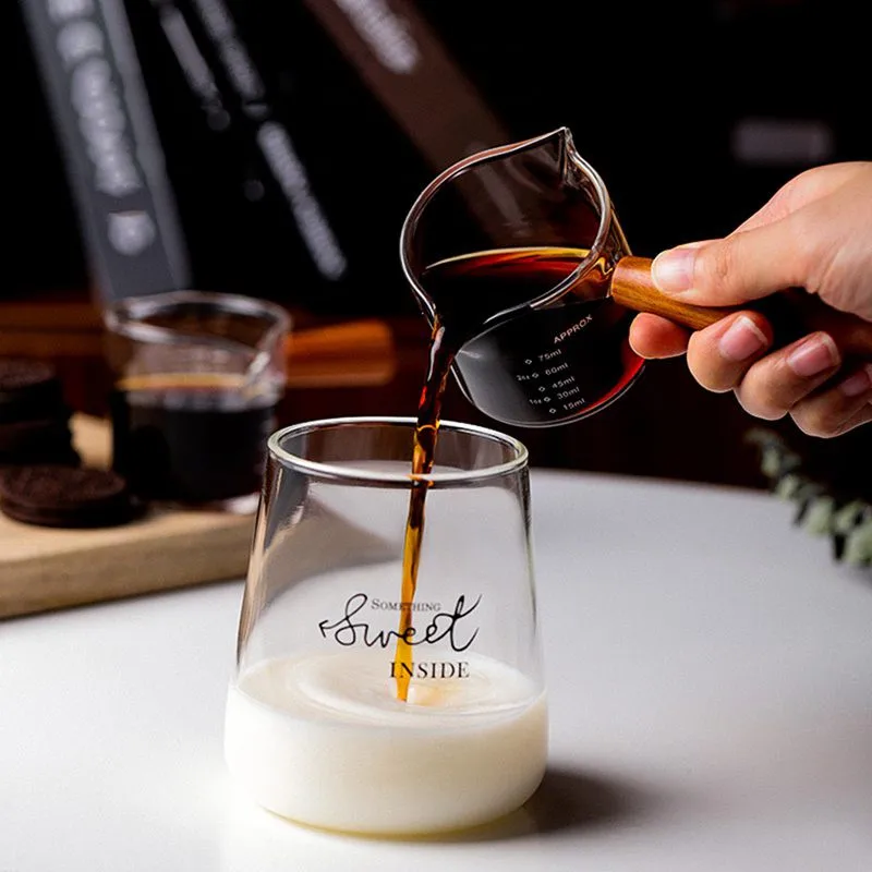 1pc/5.07oz, Coffee Pull Flower Cup With Scale, Glass Measuring Cup With Wooden Handle, Small Milk Tea Espresso Ounce Cup, High B
1pc/5.07oz, Coffee Pull Flower Cup With Scale, Glass Measuring Cup With Wooden Handle, Small Milk Tea Espresso Ounce Cup, High B