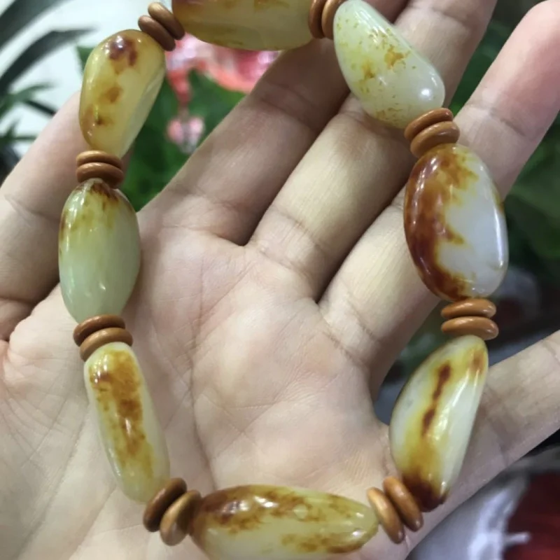 Hotan jade seedstone with skin, freeform beads, three-way , unisex bracelet jewelry
Hotan jade seedstone with skin, freeform beads, three-way , unisex bracelet jewelry