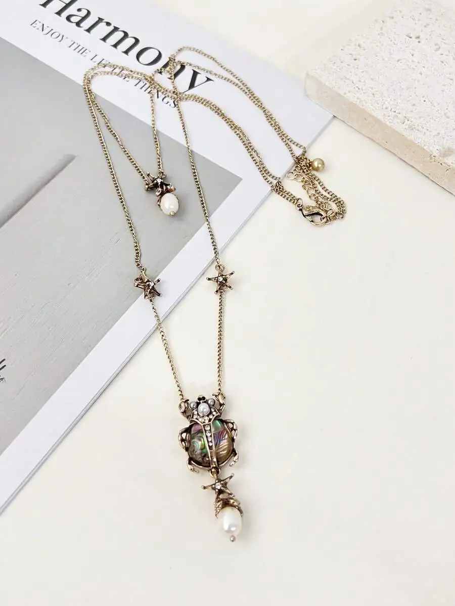 Vintage Insect And Pearl Pendant Chain Necklace For Women
Vintage Insect And Pearl Pendant Chain Necklace For Women