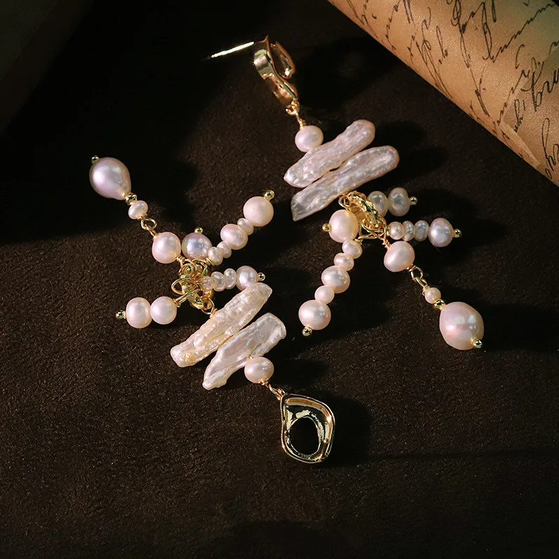 Оригинальный дизайн, серьги-гвоздики с натуральным пресноводным жемчугом для женщин, очаровательные белые бусины в стиле барокко, длинные висячие серьги с кисточками, подарок
Оригинальный дизайн, серьги-гвоздики с натуральным пресноводным жемчугом для женщин, очаровательные белые бусины в стиле барокко, длинные висячие серьги с кисточками, подарок